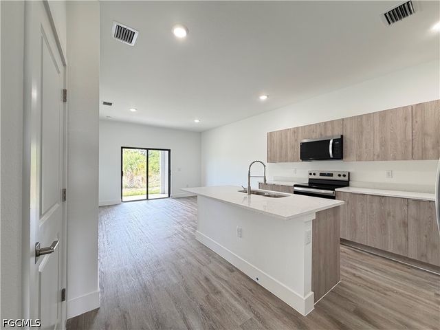 1256 MILWAUKEE BLVD, Lehigh Acres, FL 33974