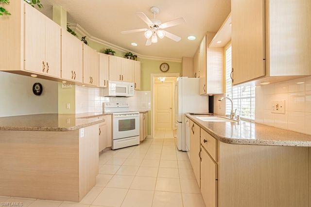 3153 Andorra CT, Naples, FL 34109