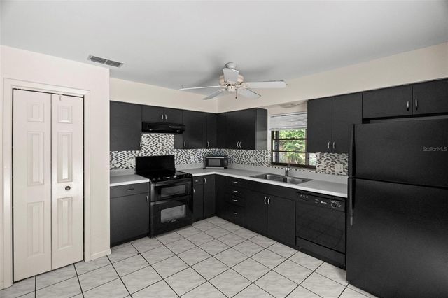 13603 WILKES DRIVE, Tampa, FL 33618