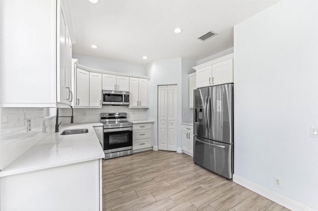 5477 Queenship Court, Greenacres, FL 33463