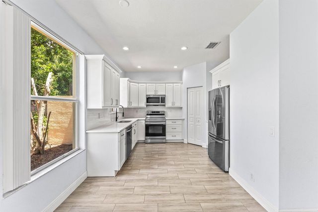 5477 Queenship Court, Greenacres, FL 33463