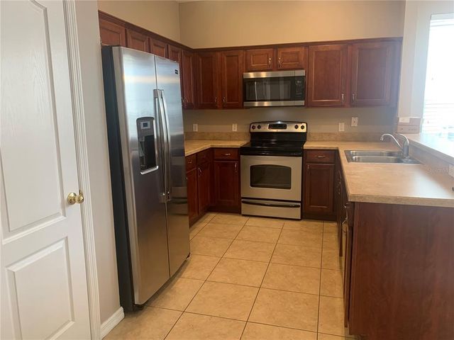 7117 RED LANTERN DRIVE 7117, Harmony, FL 34773