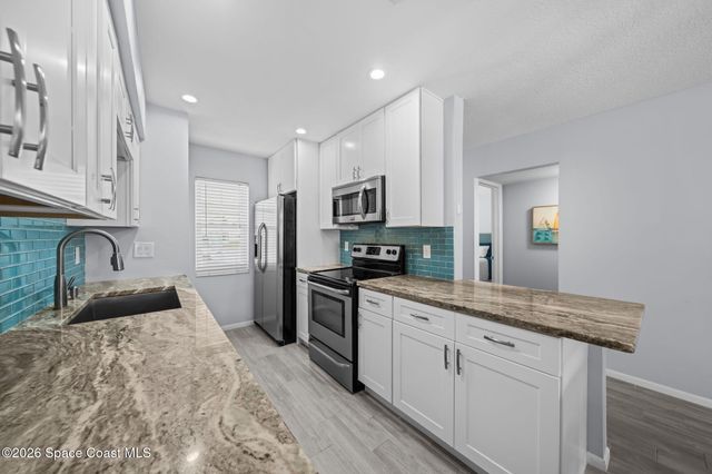 417 School Road 73, Indian Harbour Beach, FL 32937