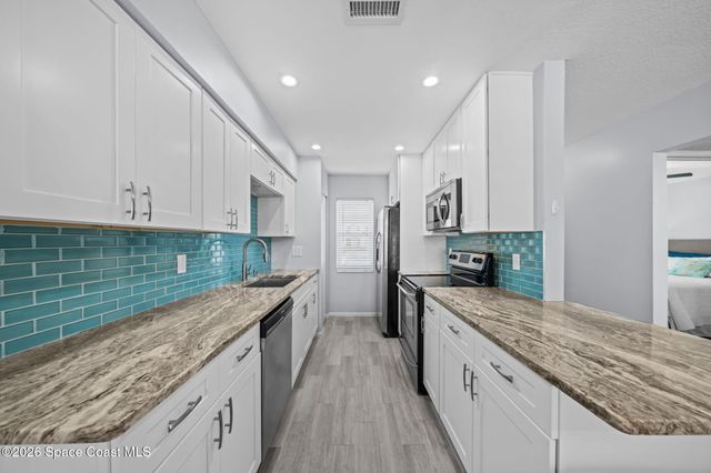 417 School Road 73, Indian Harbour Beach, FL 32937