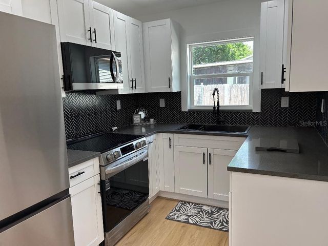 4611 W MCELROY AVENUE, Tampa, FL 33611