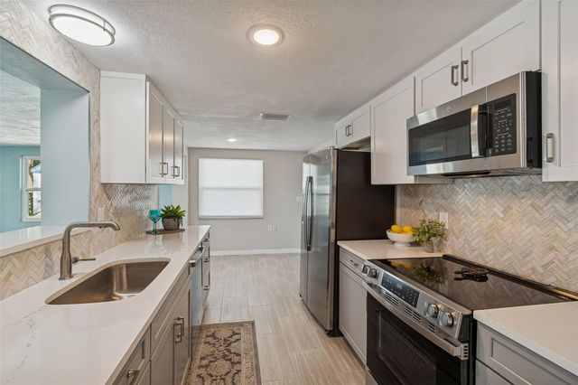 1147 RUSHMORE DRIVE, Holiday, FL 34690