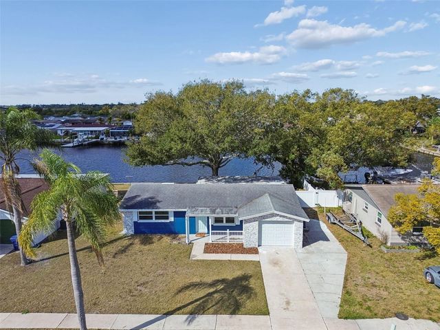 1147 RUSHMORE DRIVE, Holiday, FL 34690