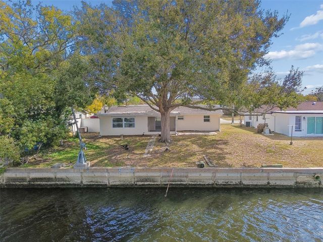 1147 RUSHMORE DRIVE, Holiday, FL 34690