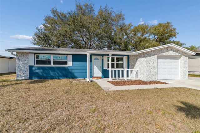 1147 RUSHMORE DRIVE, Holiday, FL 34690