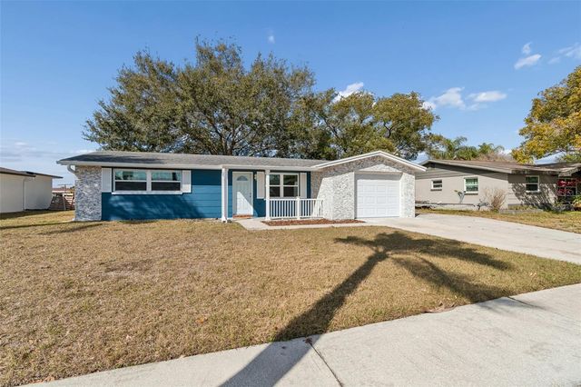 1147 RUSHMORE DRIVE, Holiday, FL 34690