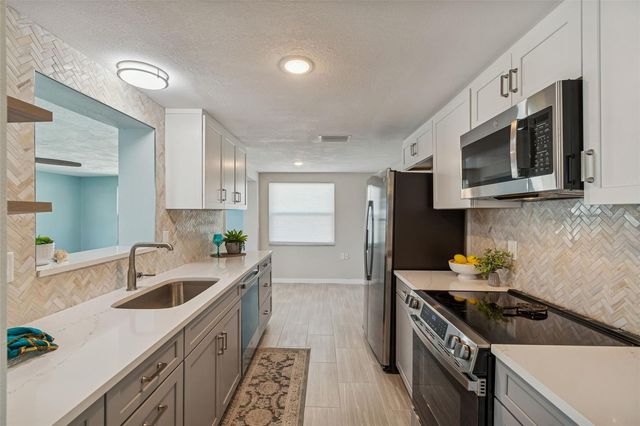 1147 RUSHMORE DRIVE, Holiday, FL 34690