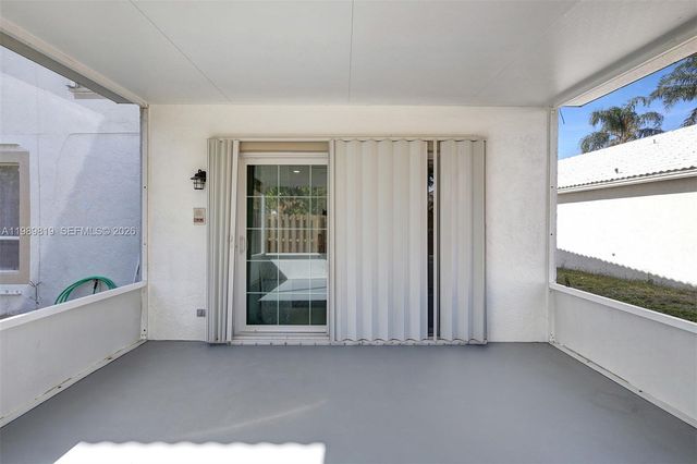 104 Wedgewood Lakes S, Greenacres, FL 33463