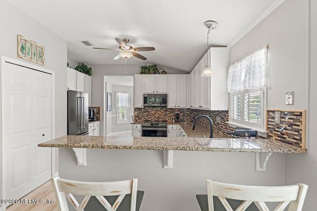 1783 MOSS CREEK Drive, Fleming Island, FL 32003