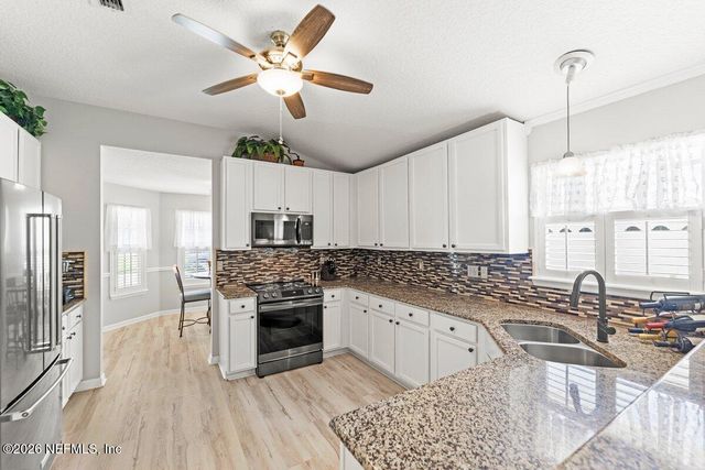 1783 MOSS CREEK Drive, Fleming Island, FL 32003