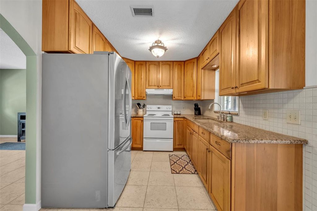 Image 12 of property listing at 430 CYPRESS ISLES ROAD, Osteen, FL 32764