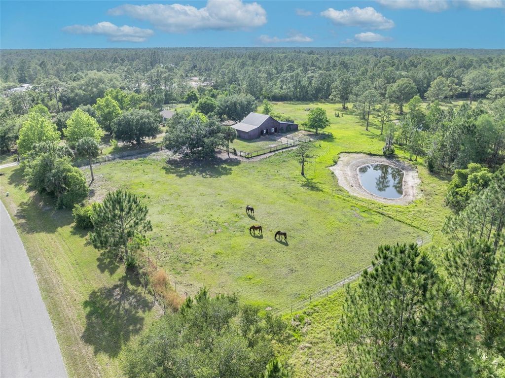 Image 42 of property listing at 430 CYPRESS ISLES ROAD, Osteen, FL 32764