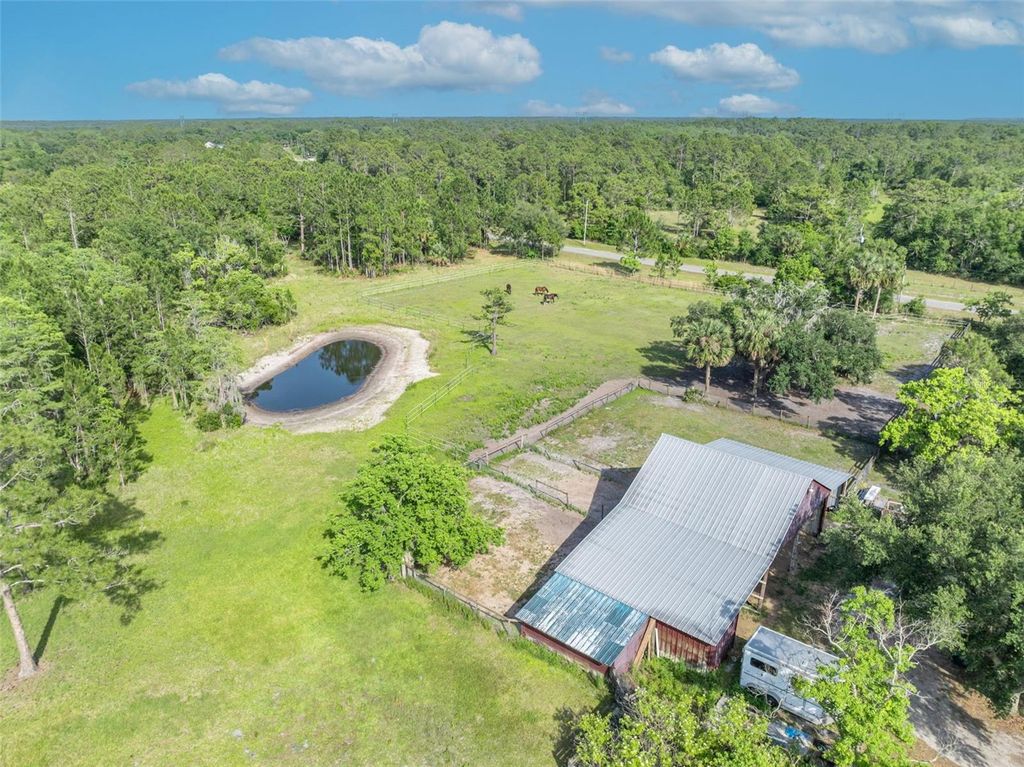 Image 44 of property listing at 430 CYPRESS ISLES ROAD, Osteen, FL 32764