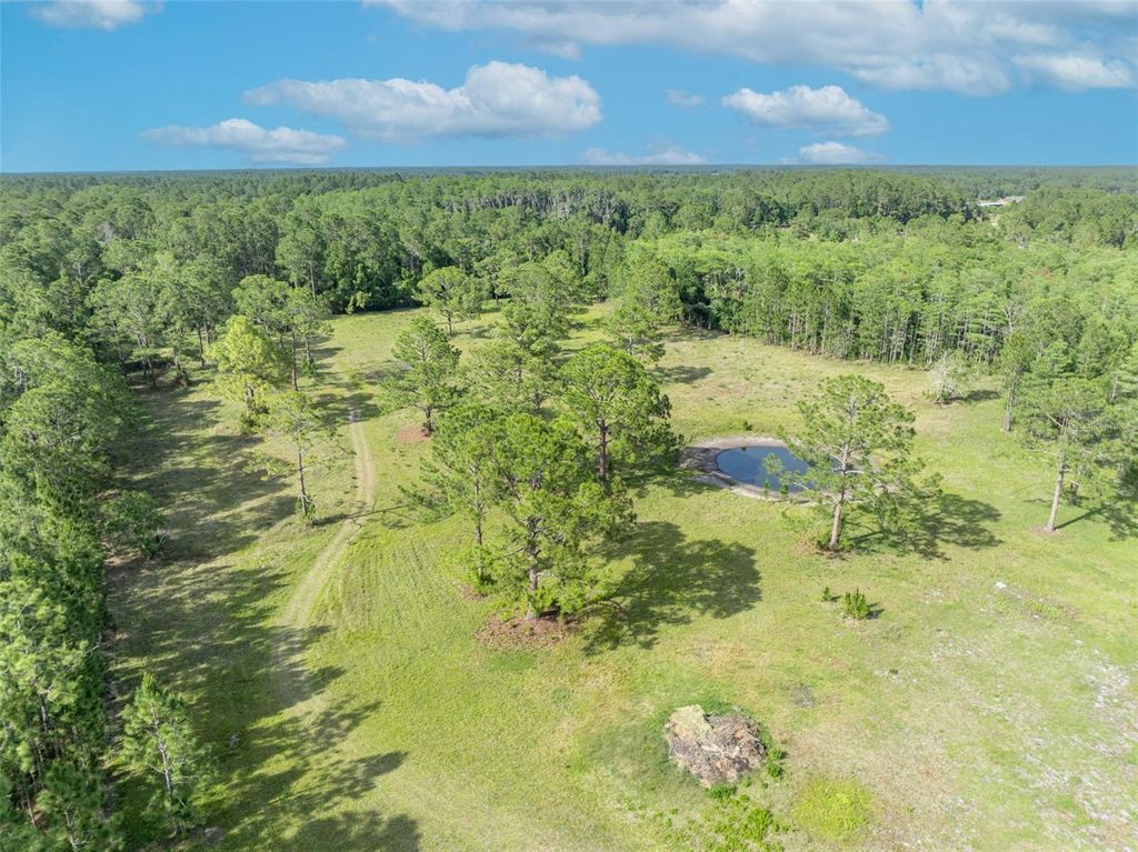 Image 45 of property listing at 430 CYPRESS ISLES ROAD, Osteen, FL 32764