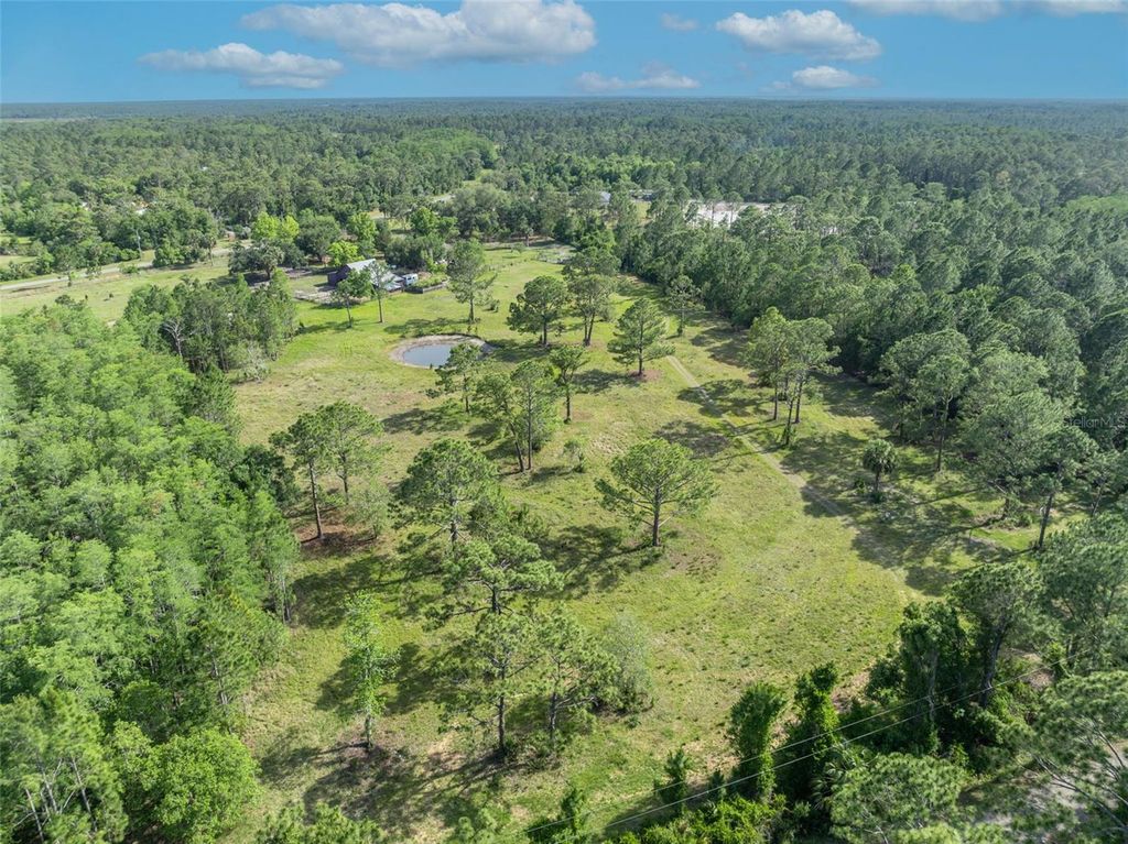 Image 46 of property listing at 430 CYPRESS ISLES ROAD, Osteen, FL 32764