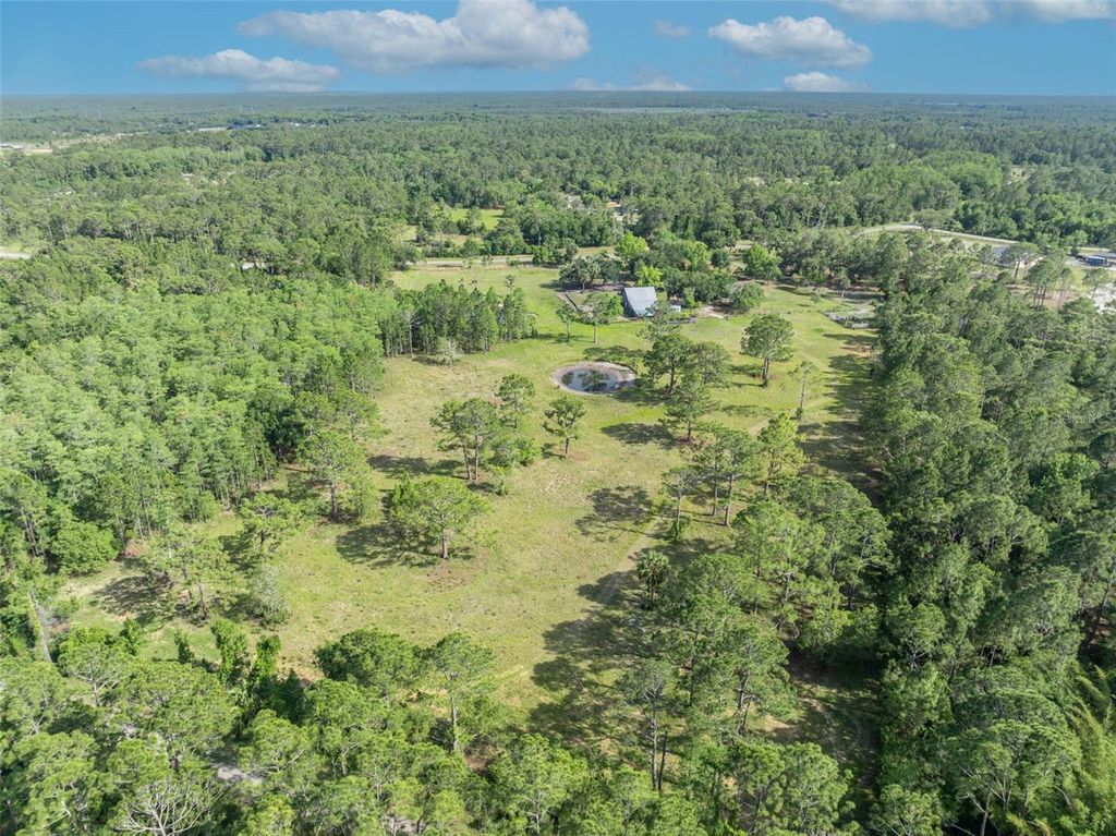 Image 47 of property listing at 430 CYPRESS ISLES ROAD, Osteen, FL 32764