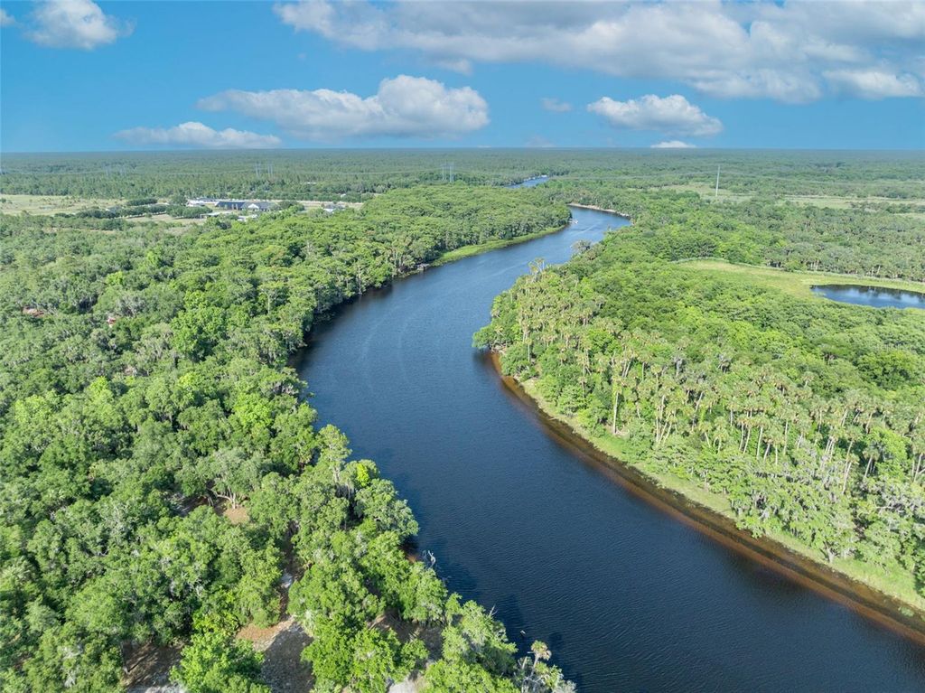 Image 54 of property listing at 430 CYPRESS ISLES ROAD, Osteen, FL 32764