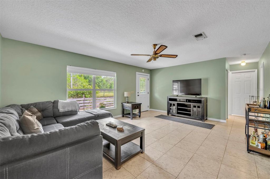 Image 8 of property listing at 430 CYPRESS ISLES ROAD, Osteen, FL 32764