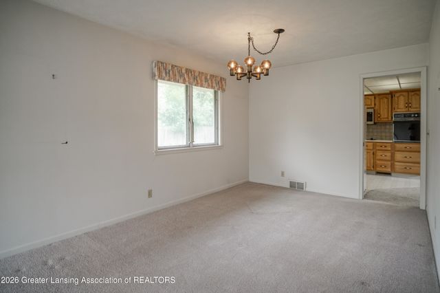 1665 Woodside Drive, East Lansing, MI 48823