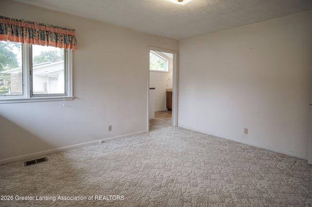 1665 Woodside Drive, East Lansing, MI 48823