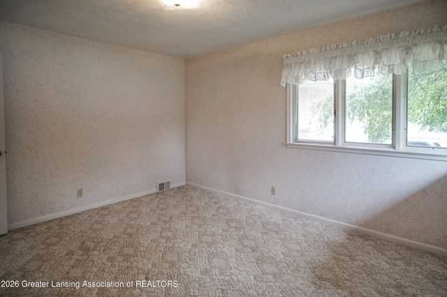 1665 Woodside Drive, East Lansing, MI 48823