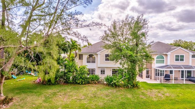 9 Admirals Court, Palm Beach Gardens, FL 33418
