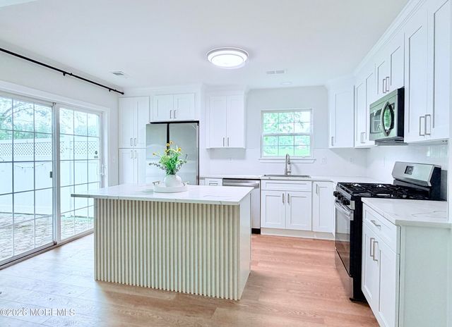 1 Whitemarsh Drive, Manalapan, NJ 07726