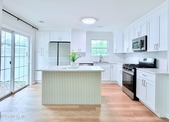 1 Whitemarsh Drive, Manalapan, NJ 07726