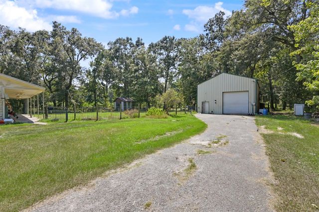 692 County Road 3371, Cleveland, TX 77327