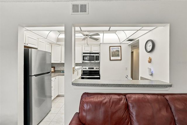 150 WAX MYRTLE WOODS COURT 7C, Deltona, FL 32725