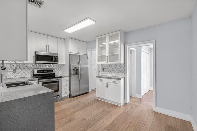 5001 SW 92nd Ter, Cooper City, FL 33328