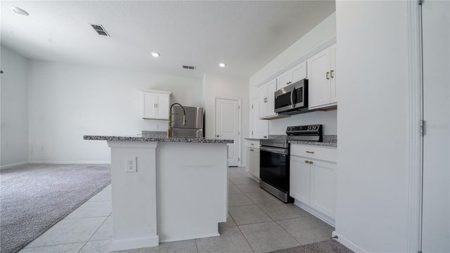 8735 SPORTSMAN LOOP, Groveland, FL 34736