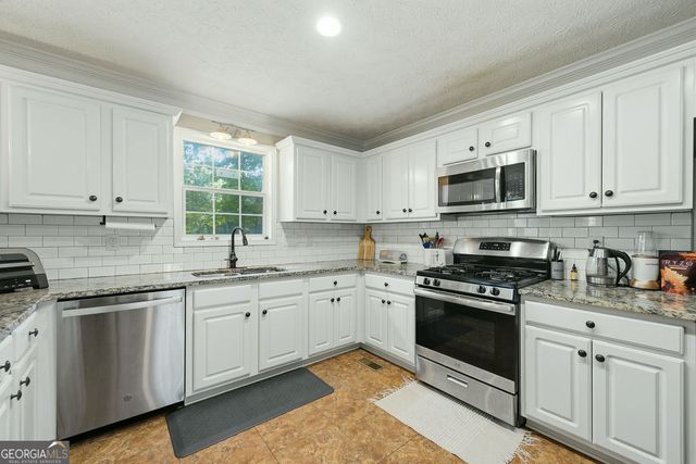 4957 HERITAGE CROSSING Drive SW, Powder Springs, GA 30127