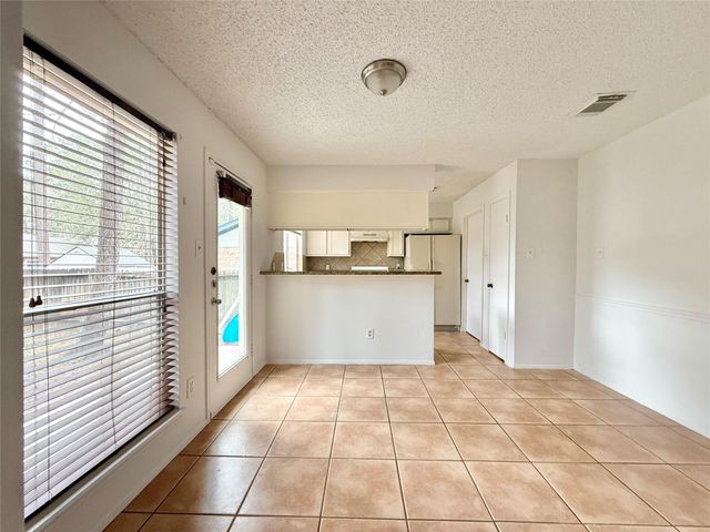 6 Maywind Court, The Woodlands, TX 77381