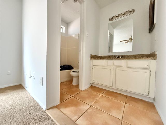 6 Maywind Court, The Woodlands, TX 77381