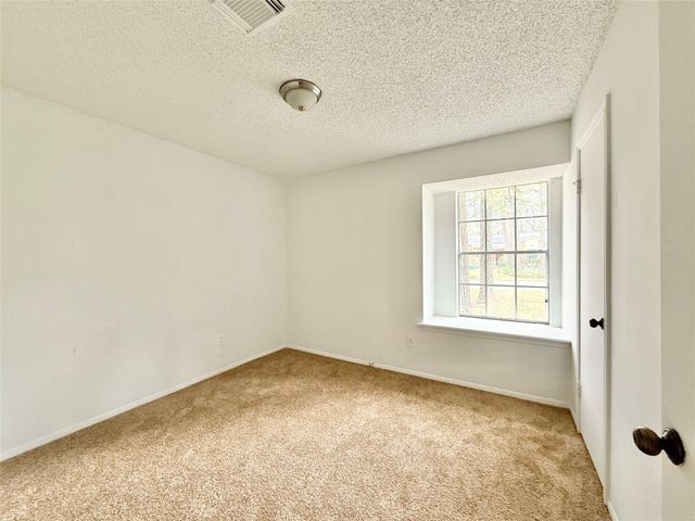 6 Maywind Court, The Woodlands, TX 77381