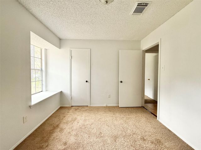 6 Maywind Court, The Woodlands, TX 77381