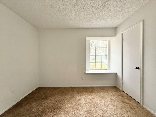 6 Maywind Court, The Woodlands, TX 77381