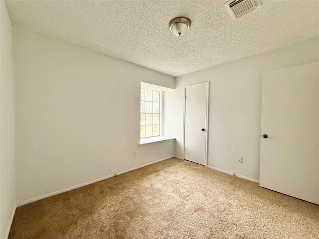 6 Maywind Court, The Woodlands, TX 77381