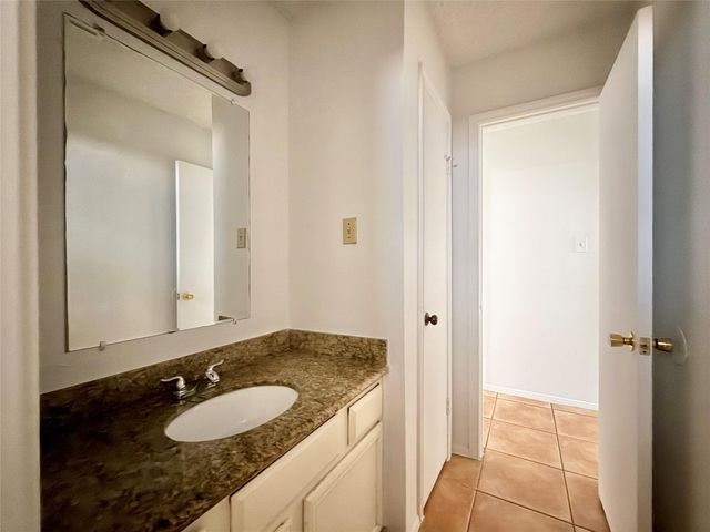 6 Maywind Court, The Woodlands, TX 77381
