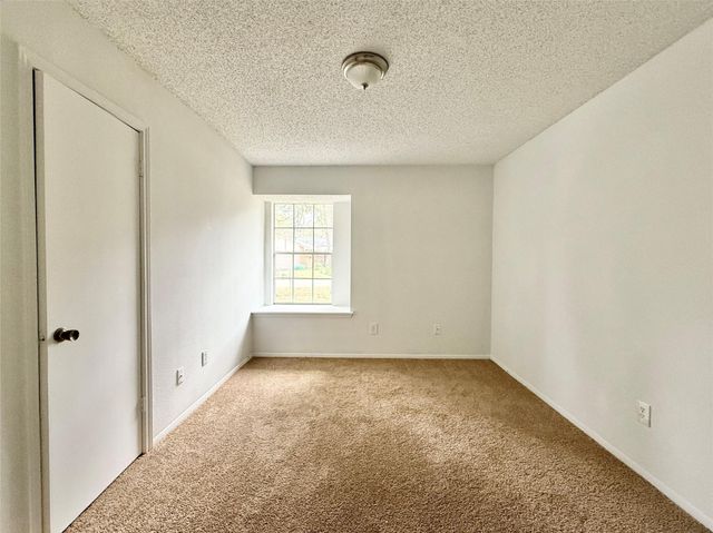 6 Maywind Court, The Woodlands, TX 77381