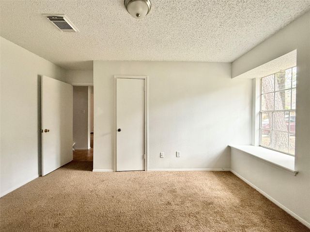 6 Maywind Court, The Woodlands, TX 77381