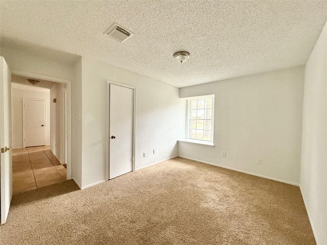 6 Maywind Court, The Woodlands, TX 77381
