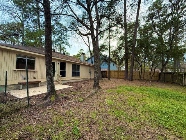 6 Maywind Court, The Woodlands, TX 77381