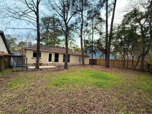 6 Maywind Court, The Woodlands, TX 77381
