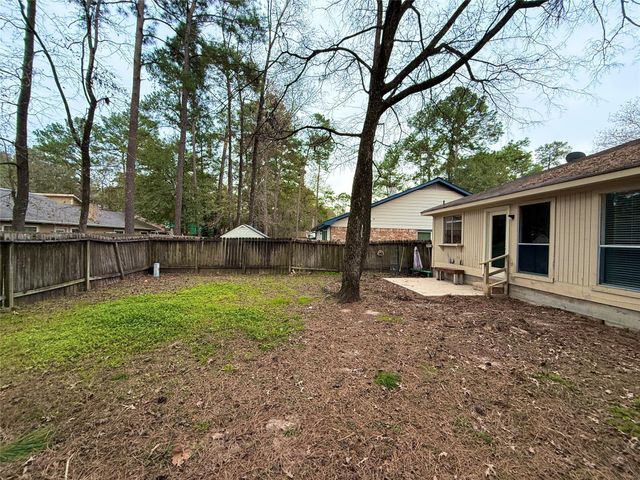6 Maywind Court, The Woodlands, TX 77381